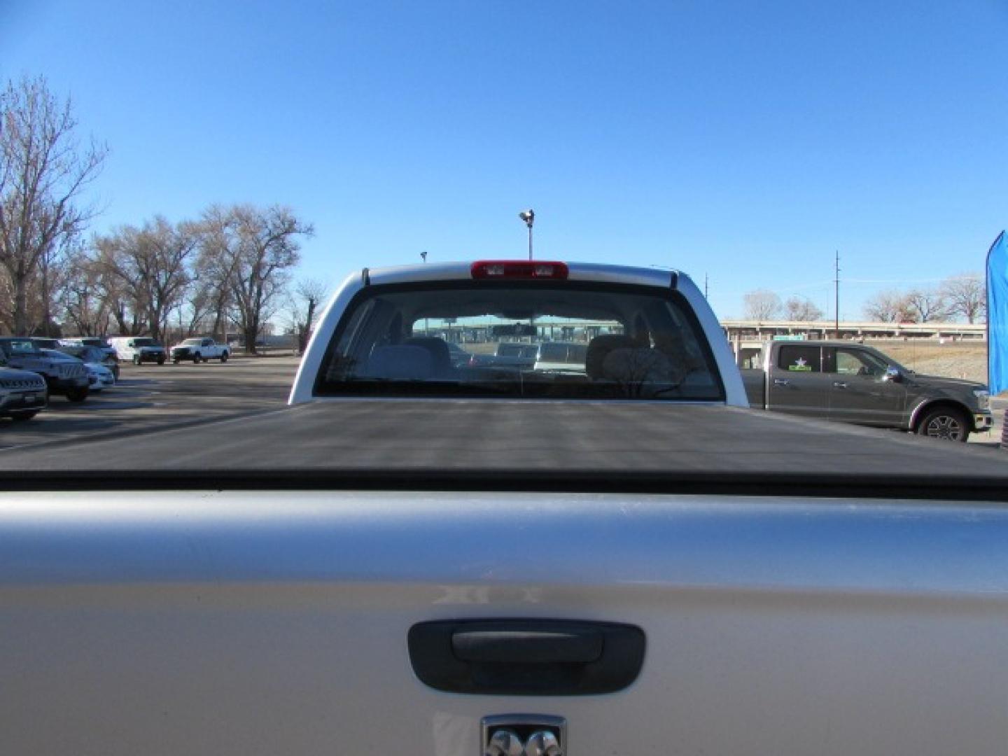 2005 Silver /Gray Dodge Ram 1500 SLT (1D7HU18D15S) with an 5.7 Hemi V8 engine engine, 5 speed automatic transmission, located at 4562 State Avenue, Billings, MT, 59101, (406) 896-9833, 45.769516, -108.526772 - 2005 Dodge Ram 1500 SLT Quad Cab Short Bed 4WD 5.7L V8 OHV 16V Hemi Engine - 5 speed automatic transmission - 4 wheel drive - 159,014 miles SLT package - air conditioning - tilt wheel - cruise control - AM/FM/CD audio - power windows and door locks - power drivers seat - privacy glass - keyles - Photo#2